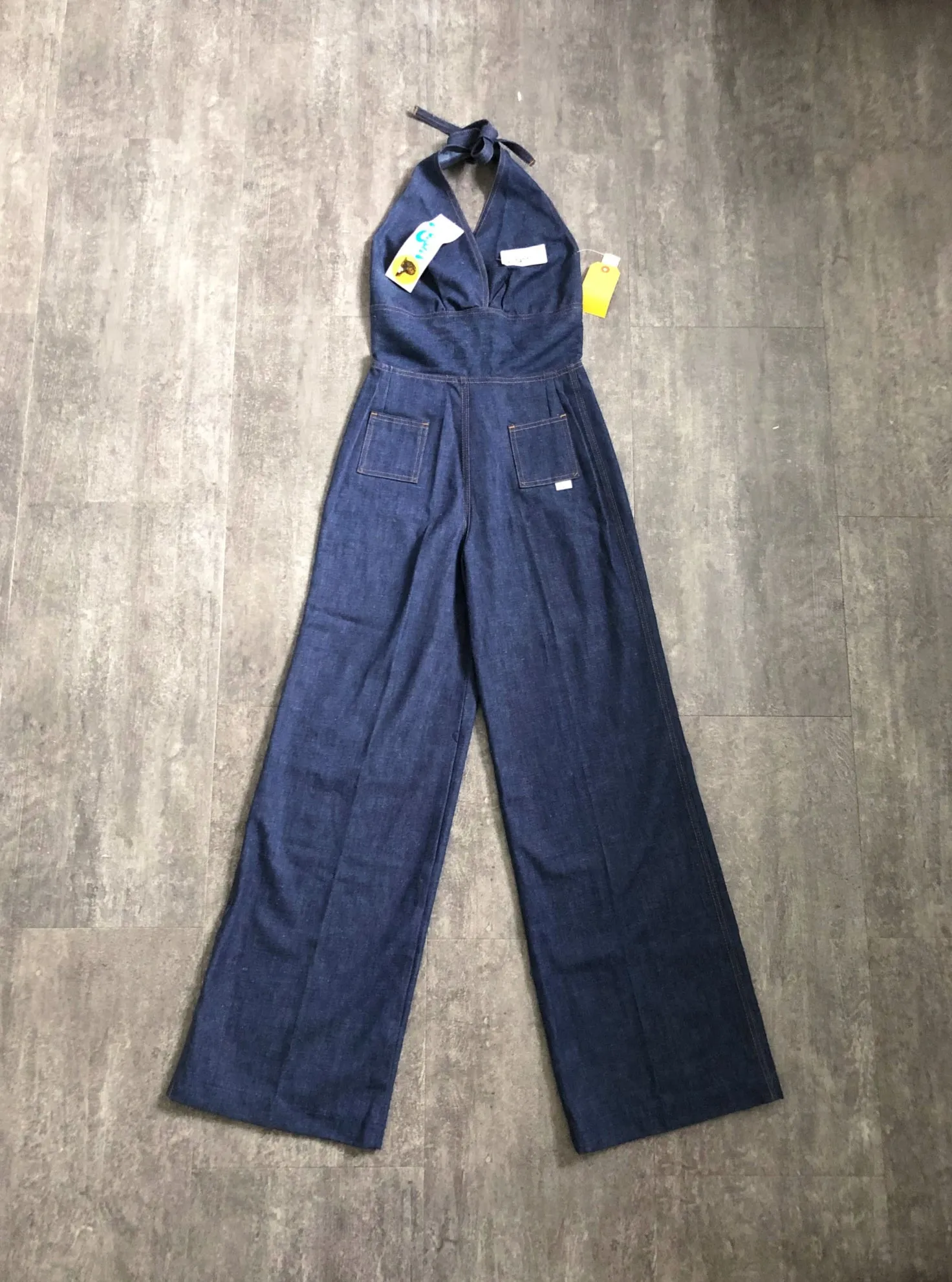 1970s denim jumpsuit . vintage 70s halter jumpsuit . size s