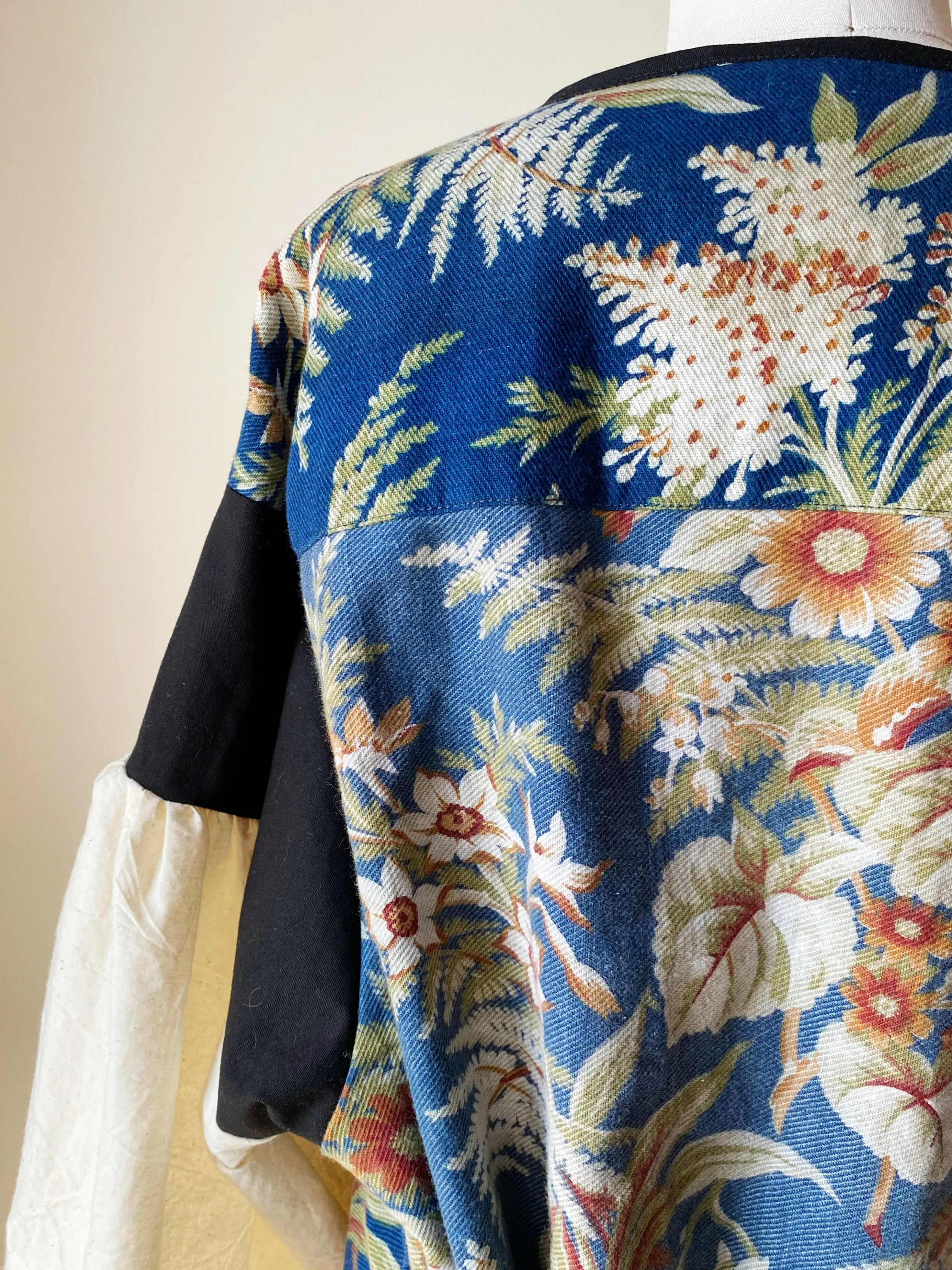 blue ground antique floral twill tie dress