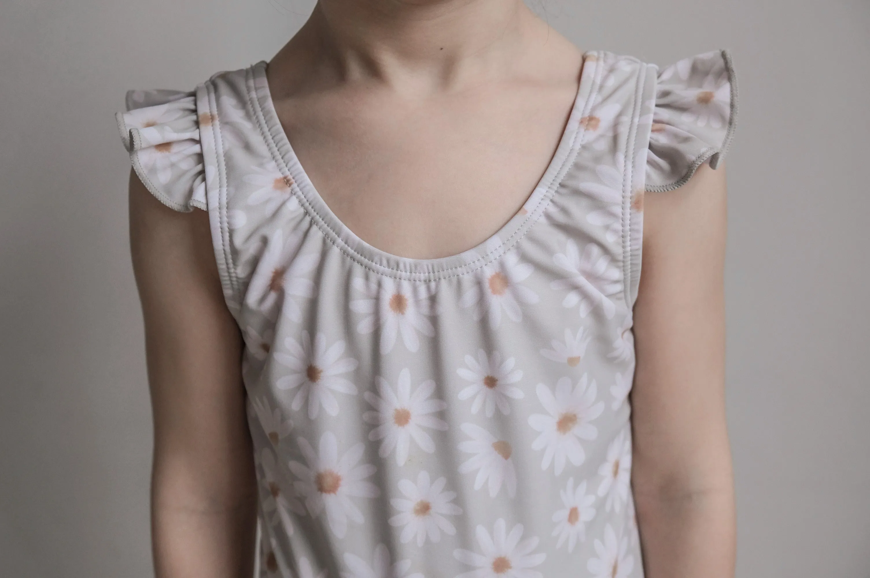 "emma" daisy print children's upf50  ruffle tank swimsuit