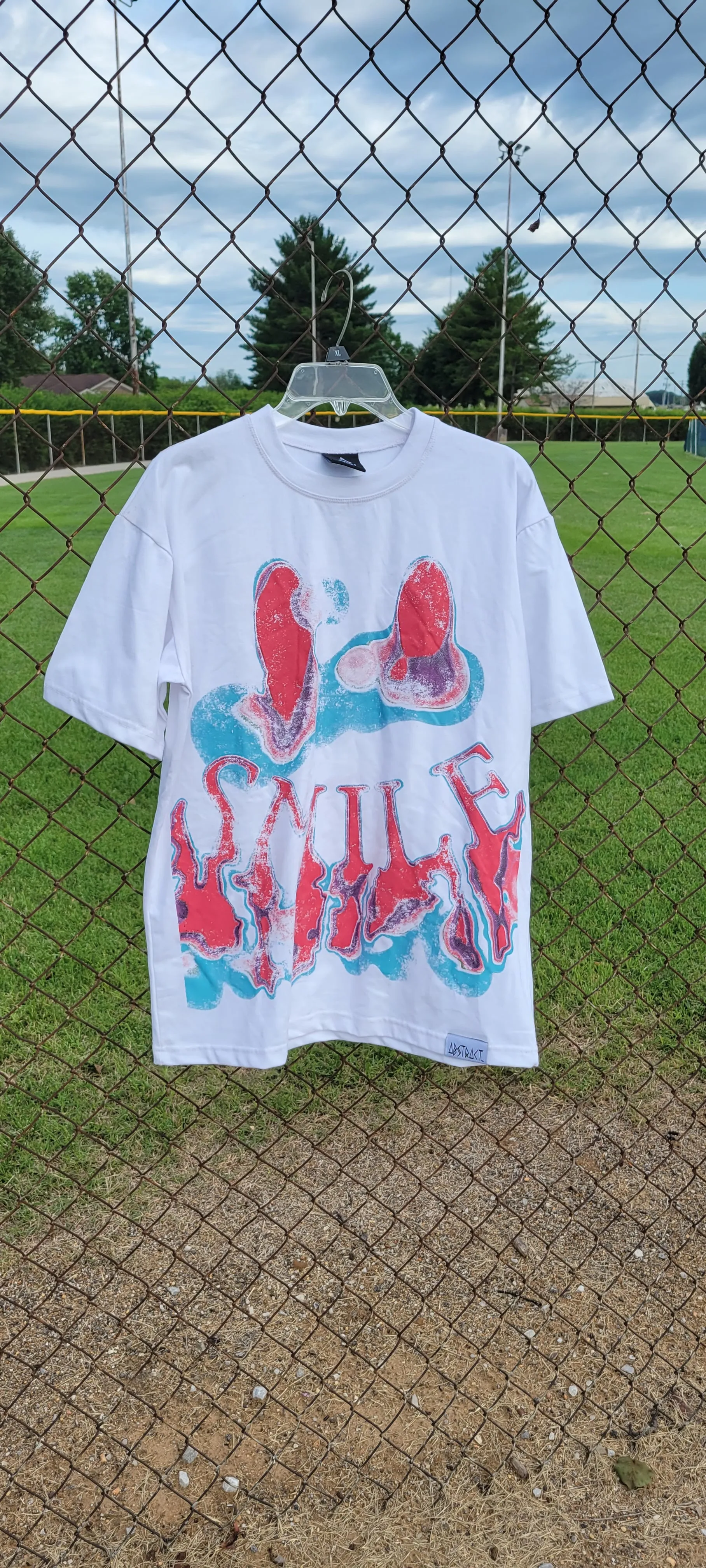 Smile Premium Oversized Tee by Abstract Lyfestyle Ltd Co