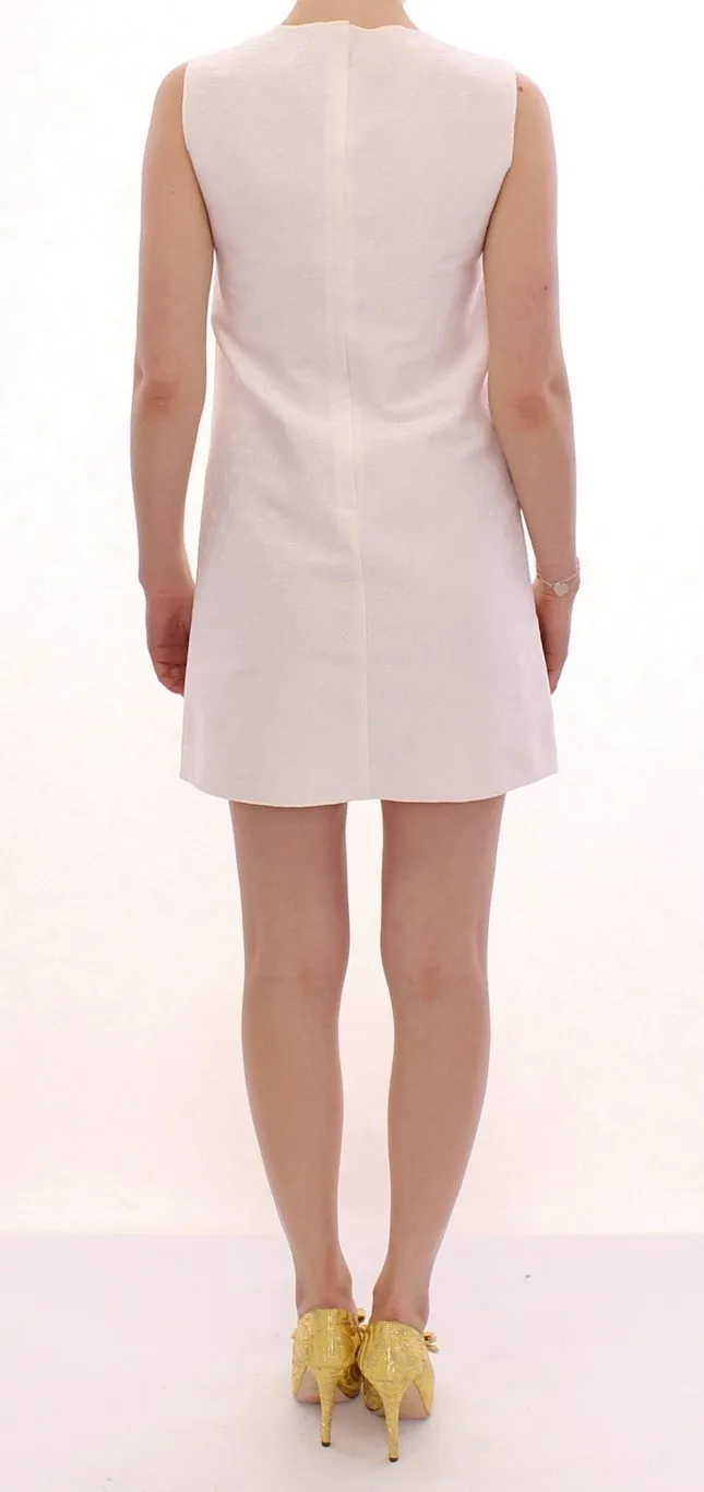 White polka dotted mini shift dress